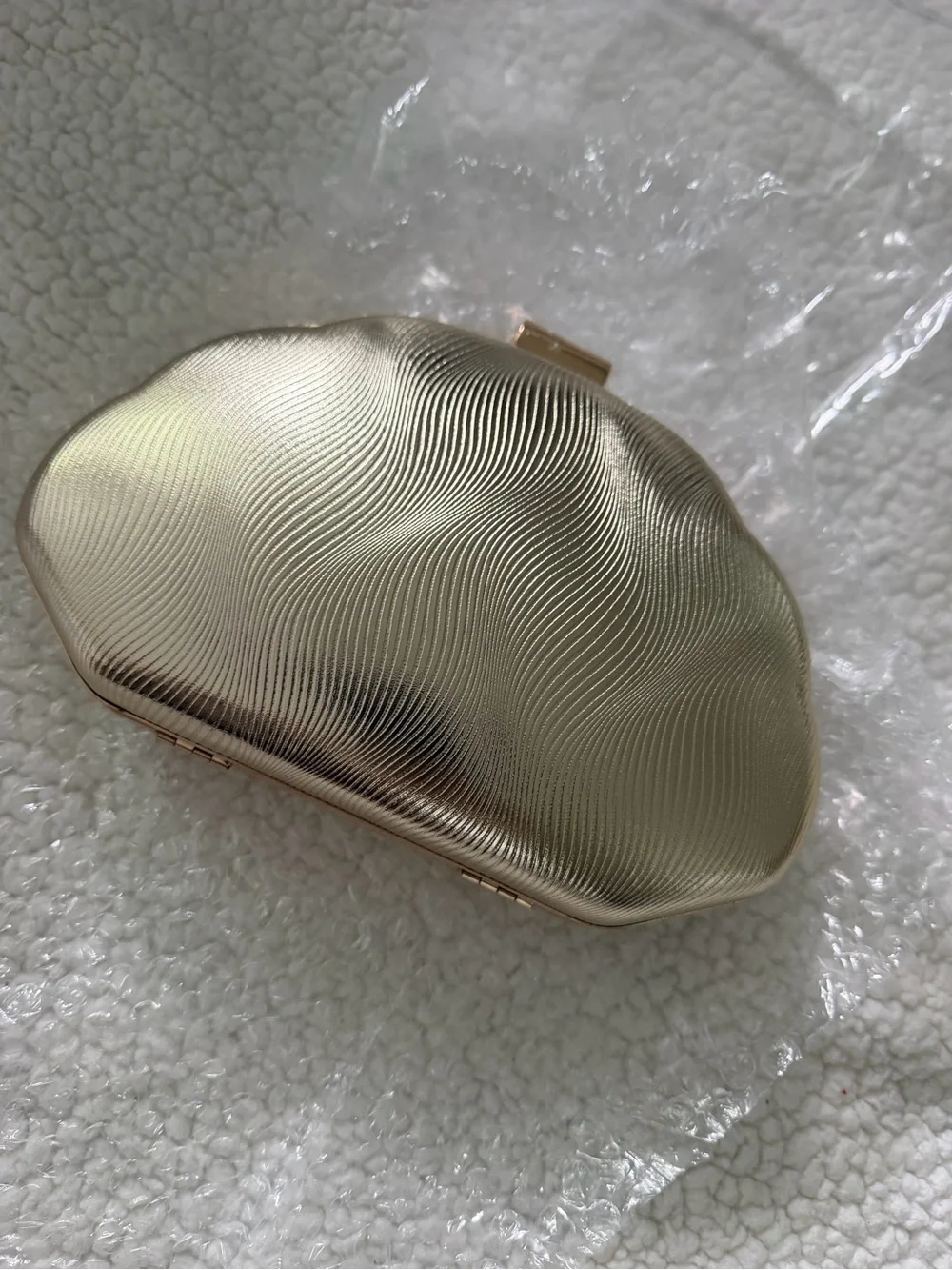Gold Wave-Textured Evening Clutch with Top Clasp